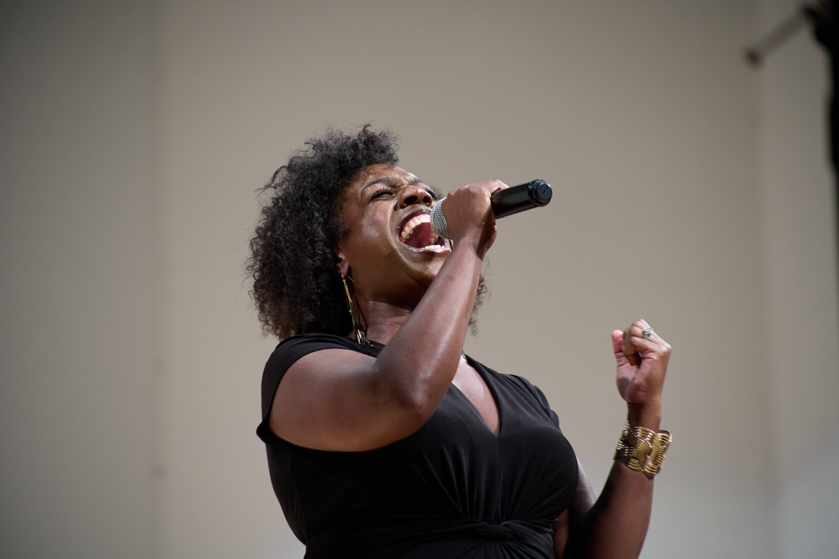 An image of a singer belting out a tune.